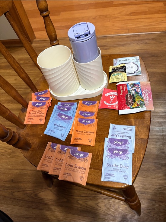 Starbucks Other - Starbucks cup with yogi tea bags in beige containers. Tea bags in container.